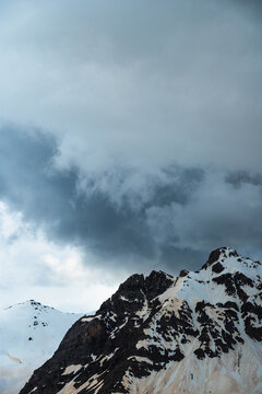 Clouds over a mountain range in the Alps