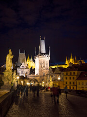 Naklejka premium Tourists, Nighttime, Charles Bridge, Prague, Czechia.