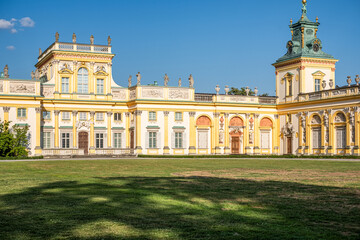 Warsaw, Poland, Wilanow, Majestic palace with intricate architecture and lush green lawns, showcasing royal heritage and summer beauty, perfect for travel exploration and cultural legacy appreciation