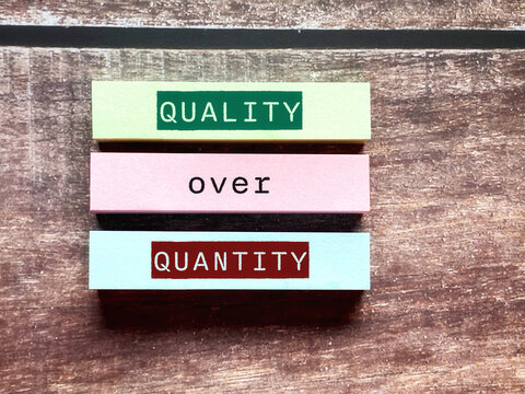 Quality over quantity concept background. Stock photo.