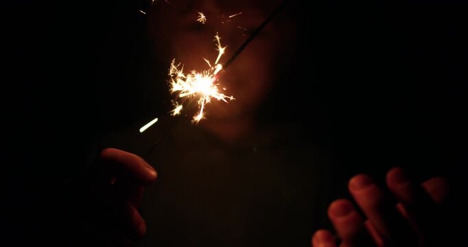 Happy 5 Year Old Boy Holding Sparkler at Night |  4K, 12 Bit Braw Video Available