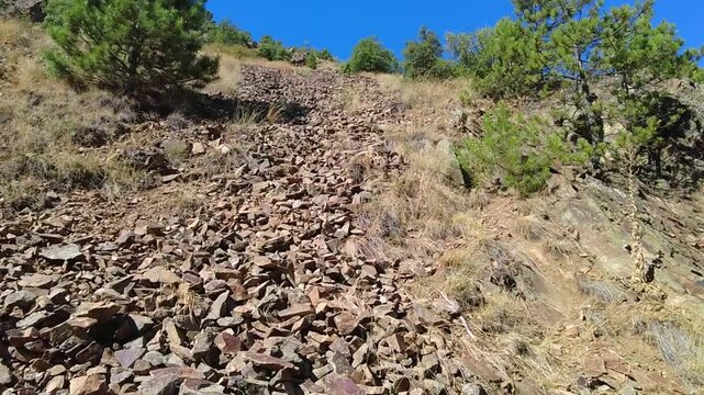 A rock river in the form of a rockfall from the mountains poses a great danger to tourists.