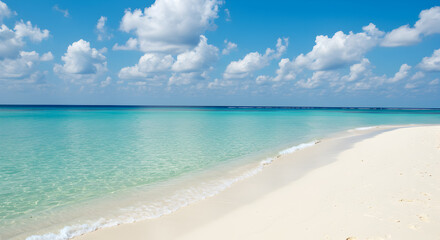 Azure Waters Meet White Sands on a Tropical Beach Under a Partly Cloudy Sky in Bright Daylight
