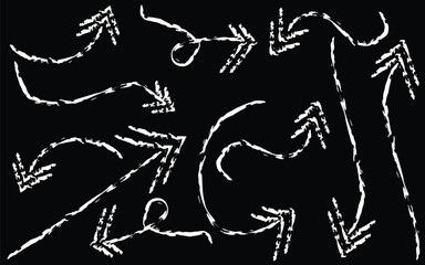 Hand drawn white arrows pointing in different directions on a black background