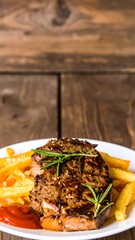 Grilled steak with crispy fries