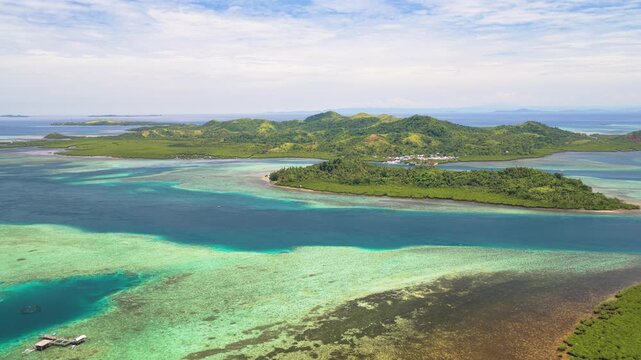 Scenic Cinematic aerial drone video of Siargao island with East Bucas Island and Bancuyo Island, Dapa, Surigao den Norte, Mindanao, Philippines