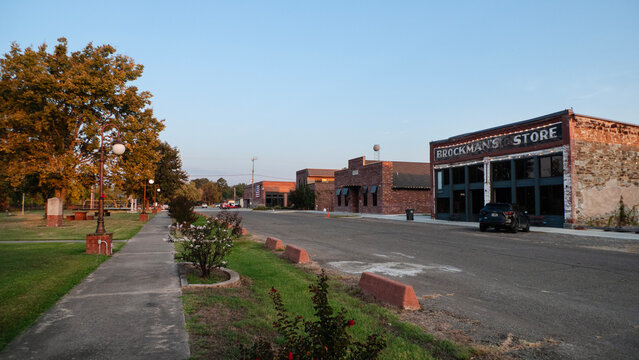 Vian, Oklahoma Downtown area on North Main Sreet. Historic buildings in downtown Vian, Oklahoma, including Brockman's Store, a parked in front. A sidewalk lined with street lights across the street.