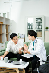 Doctor giving emotional support and medication advice to stressed male patient. Mental health, therapy, and care