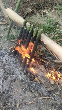Making of Bamboo Rice (Sunga Pitha) during Bihu in Assam