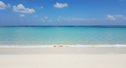 Fototapeta premium White Sandy Beach Meets Aqua Ocean Under Blue Skies