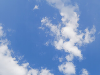 Bright Blue Sky with Fluffy White Clouds