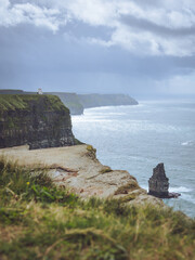 A view of Sea Stack and Sea Stump, O'Brien's Tower and the Cliffs of Moher in County Clare, Ireland