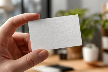 Smooth White Blank Business Card Mockup Held in Hand