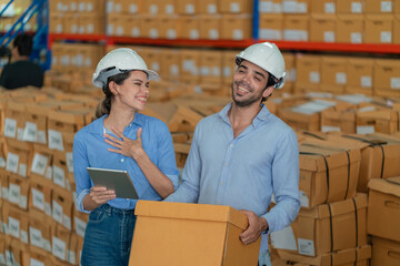 Warehouse worker working in warehouse storage. Foreman or worker work at factory site check up products in site. Inventory worker working in  factory Storehouse