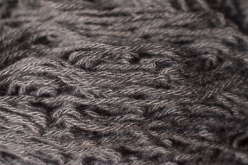 Close-up wool textile. Textured surface of wool fabric with intricate fibers, great for textile backgrounds and design projects.