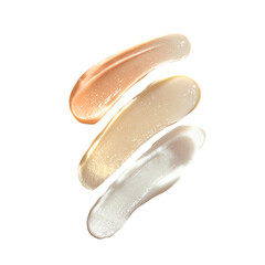 Three swirled, textured cream samples in varying light beige tones