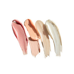 Four swatches of creamy, light-toned cosmetic products.  Swatches swirled in soft, pastel shades from pinkish-nude to off-white