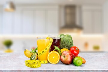 collection of fresh tasty fruits and vegetables at modern kitchen