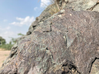 Raw Rock Texture stark beauty of nature is captured in this stunning, landscape view of a rugged granite formation, a symbol of enduring strength. 