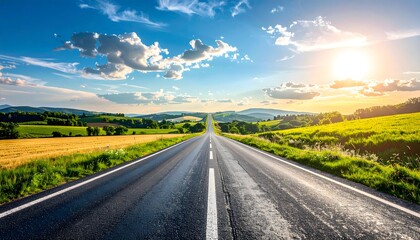 Straight open road through vibrant green fields under a bright sunny sky, leading to the horizon, symbolizing journey and freedom.