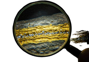 Gold and Diamond Specimen Through Magnifying Glass