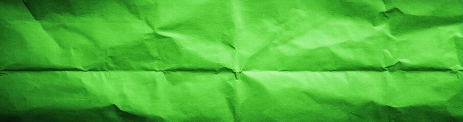 Vibrant green crumpled paper texture