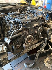Diesel Engine Repair in Car at Auto Service Garage © White Craft 