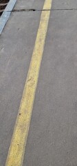 Asphalt with yellow markings