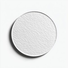 Circular, textured white disc on white background