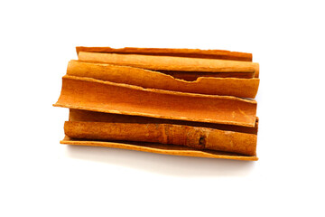 Dried cinnamon sticks arranged in a bundle.