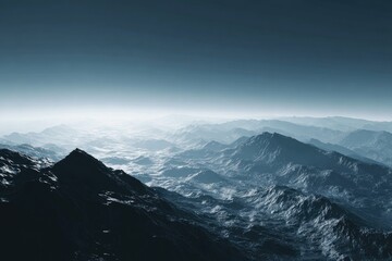 Vast mountain range, misty atmosphere