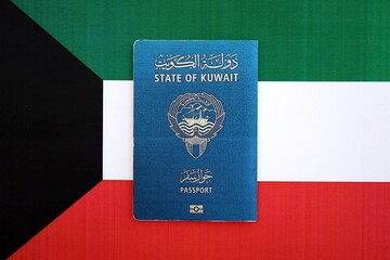 Kuwaiti passport on flag. The concept of citizenship