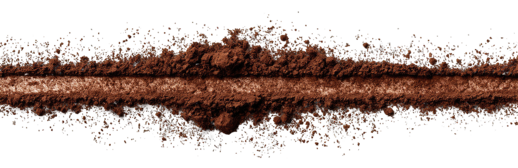 Brown substance with speckled detail, resembling a ribbon or streak