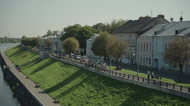 View of the Stepan Razin embankment of the Tvertsa River in the city of Tver. Dolly camera