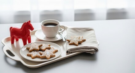Coffee cup with star-shaped cookies and red horse toy on tray - Concept of New Year 2026  