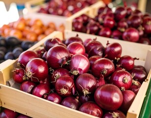 Close-up of red onions in wooden crates at a market
