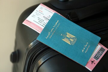 Egyptian passport and avia tickets on travel bag. The concept of travel and vacation