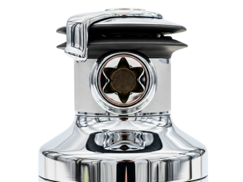 Highly polished chrome marine winch for sailing equipment on a transparent background
