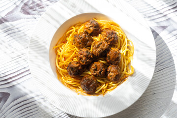 Close-Up of Spanish Albondigas Meatballs in Tomato Sauce on Spaghetti
