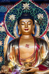 Buddha surrounded by lotus flowers, Wannian temple ('Temple of the ten thousand years'), Emeishan,...