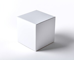 Naklejka premium A plain, white, square cardboard box sits on a white surface