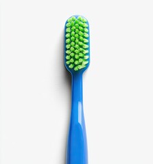 Close-up of a vibrant blue toothbrush with bright green bristles