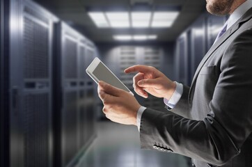 Admin in data center system monitoring on tablet device