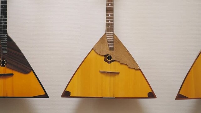 Balalaika is a Russian and Belarusian folk stringed musical instrument.
