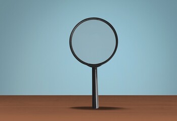 Obraz na płótnie Canvas Magnifying Glass on top of Wooden Table,