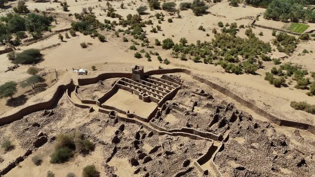 old ancient stone ruins aerial top down view of Ouadane in Mauritania, UNESCO World Heritage site in the Sahara desert