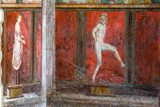 Ruins of Pompeii, Italy. Decoration detail. Fresco painting on the wall of Villa of the Mysteries.