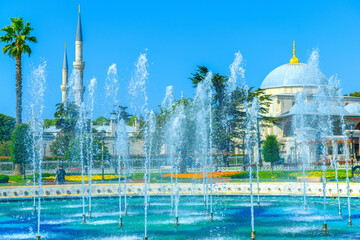 Fountain with water and splashes in Sultanahmet Square, Istanbul, near Hagia Sophia.