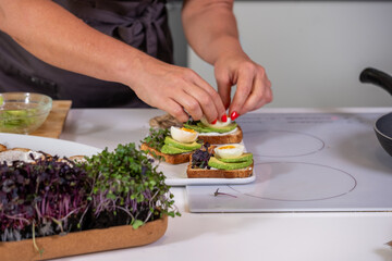 Banner with Hands preparing healthy snacks with fresh ingredients, showcasing vibrant vegetables...