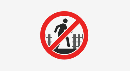 Symbol prohibiting crossing railway tracks for safety awareness. No trespassing with person silhouette. No trespassing is displayed on sign, showing dangerous railway with fence.